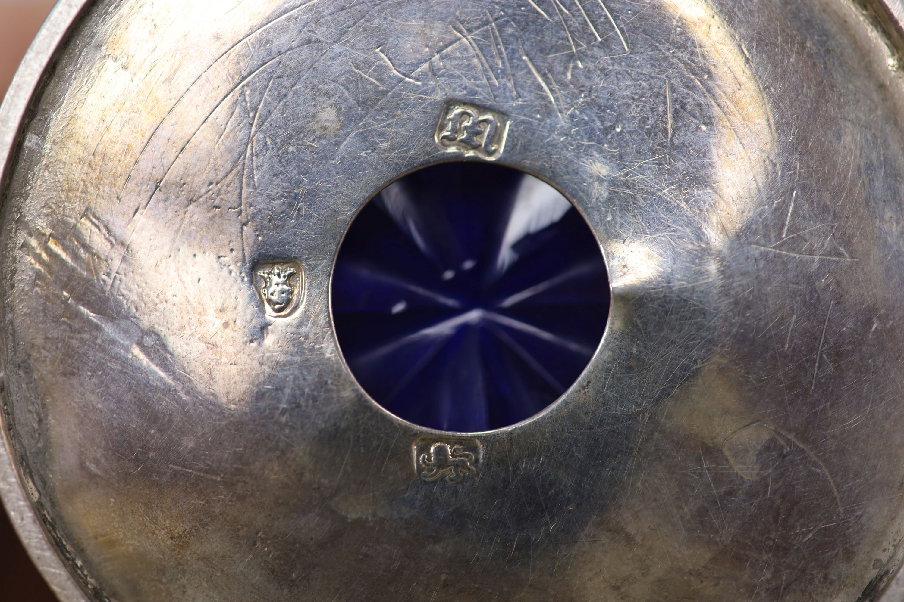 A George III pierced silver drum mustard, London, 1767, (a.f.) with blue glass liner